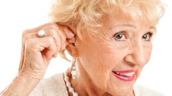 older woman hearing aid